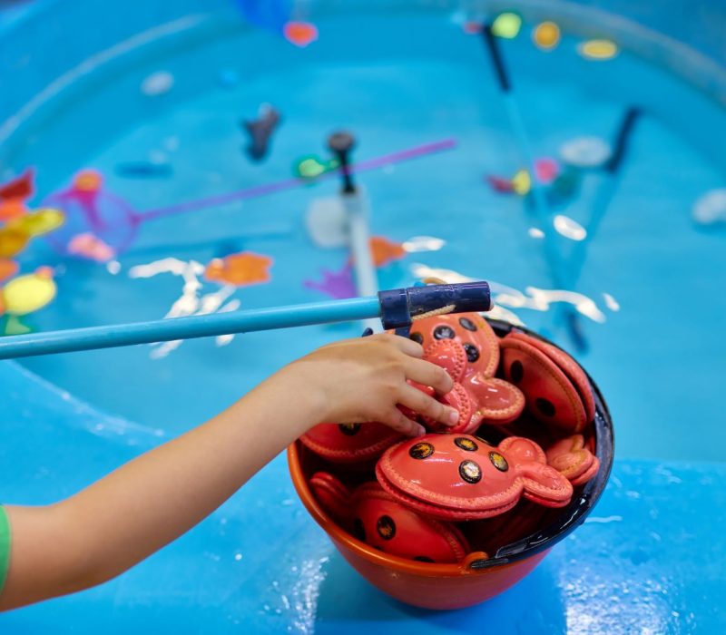 multicolored-plastic-toy-fish-pool-children-s-fishing-concept-game